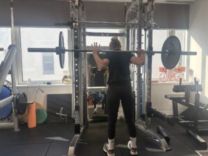 Amy Ross Physiotherapist demonstrates rehabilitation exercise at Star Physio