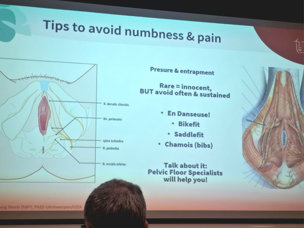 Conference presentation slide at the International Bike Fitting Institute Conference discussing tips to reduce cycling numbness, saddle pain and discomfort
