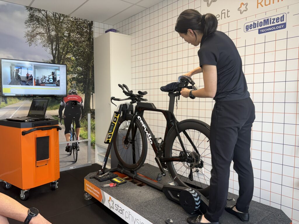 Julie Pham performing a triathlon bikefit with pressure mapping at Star Physio’s West Perth bikefit studio