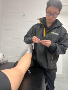 Volleyball physiotherapist Aaron Tay from Star Physio WA